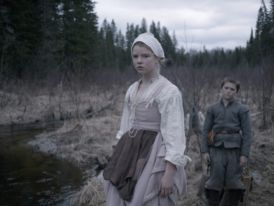 This photo provided by courtesy of A24 shows Anya Taylor-Joy, left, as Thomasin, and Harvey Scrimshaw as Caleb in a scene from the film, The Witch. (Rafy/A24 via AP)