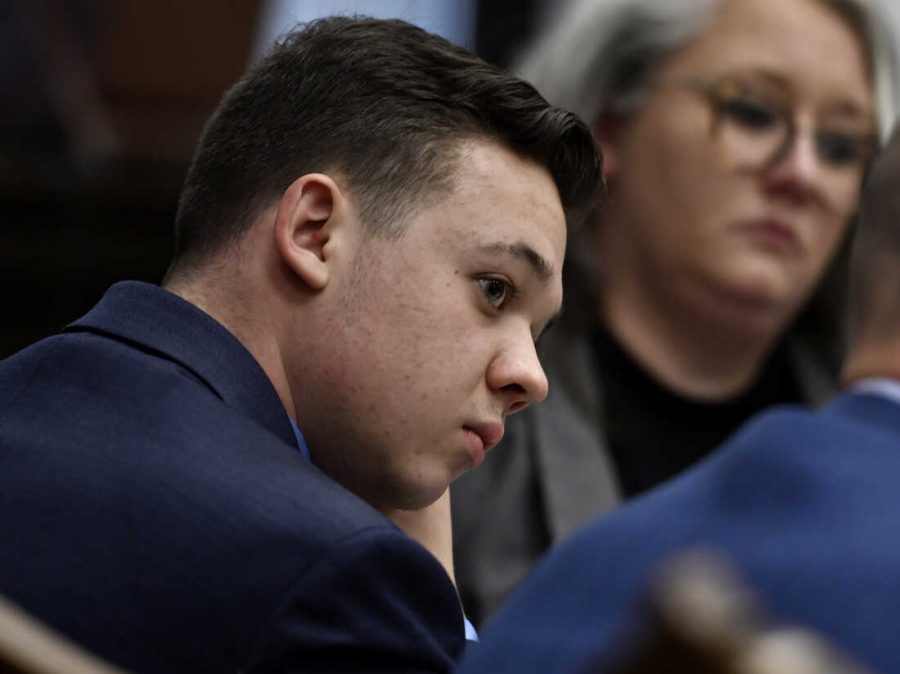 Kyle Rittenhouse, left, listens as his attorney delivers his closing argument during Rittenhouses trial.(Sean Krajacic/The Kenosha News via AP, Pool)
