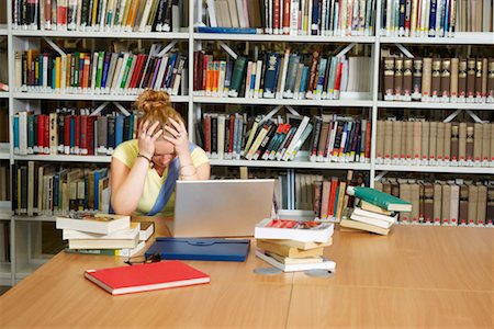 100% real image of a Winchester student struggling to read in the library