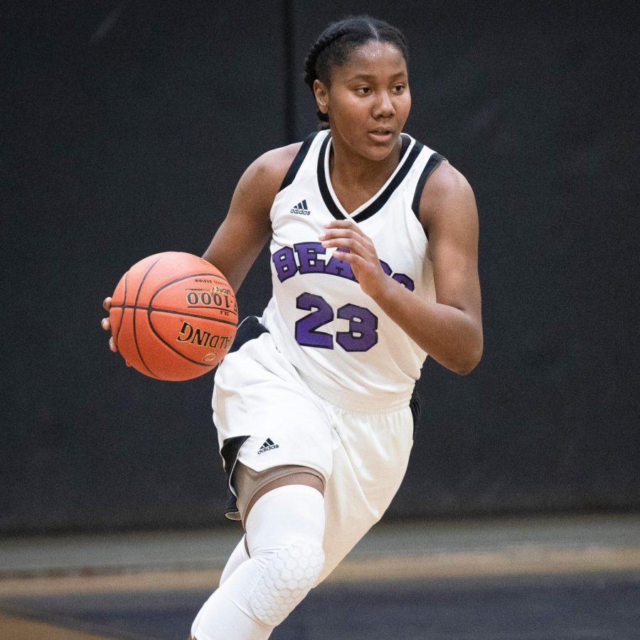 Nadia Moore Reaches 1,000 Points for Girls Basketball – VOICES